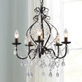 Celeste traditional black metal and crystal 5-light chandelier in a bright interior