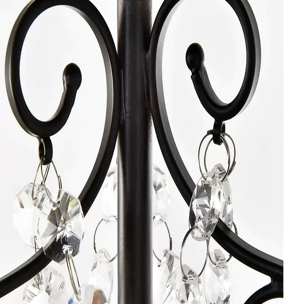 Black metal scrollwork and crystal detail on Celeste chandelier